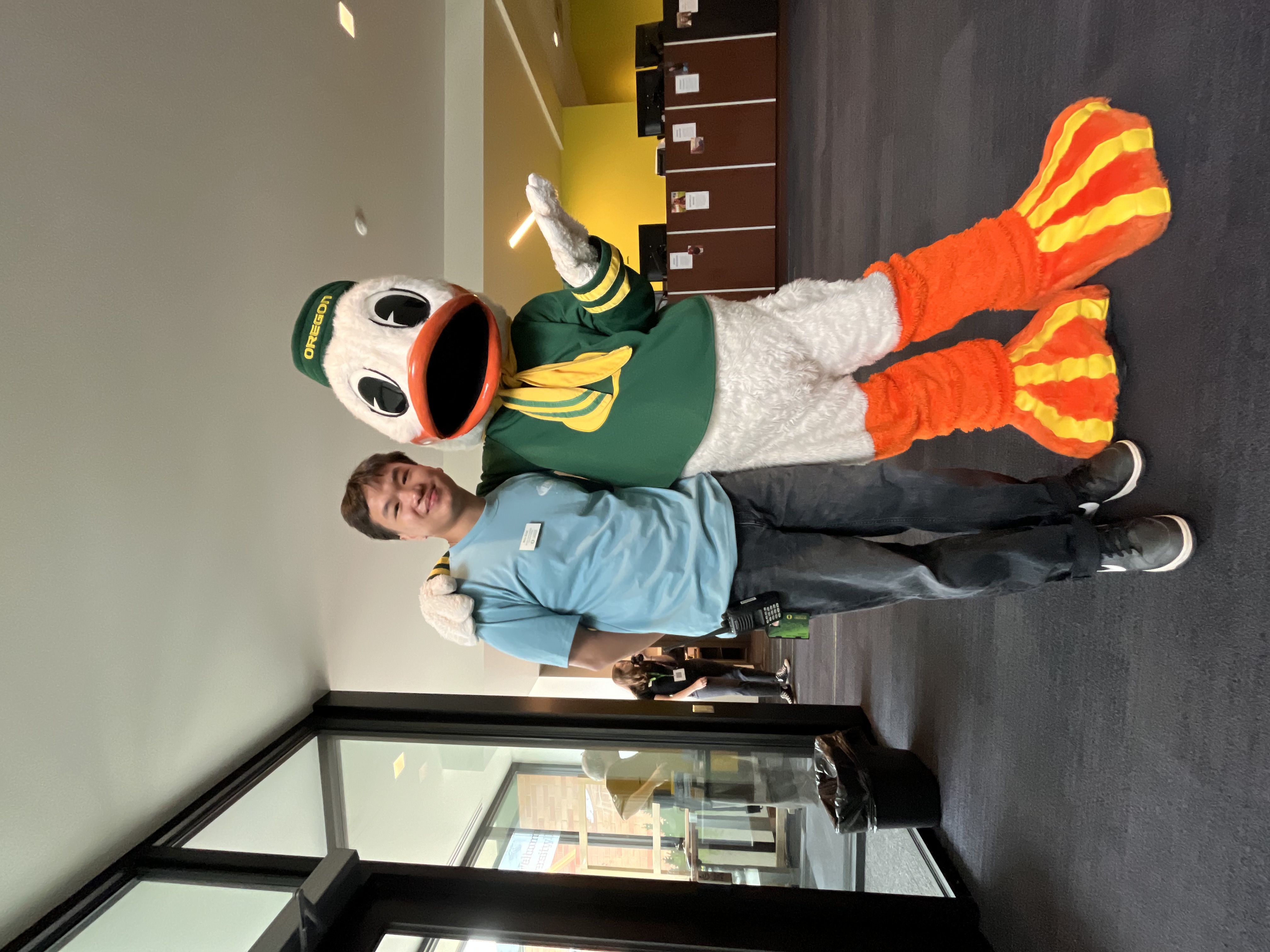 Nico Sicat with the Oregon Duck mascot